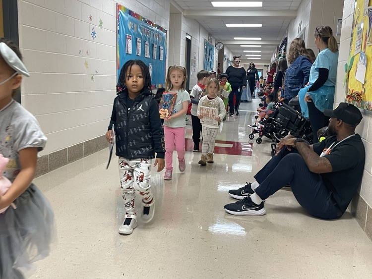 Sippel character parade with students and teachers dressed up 