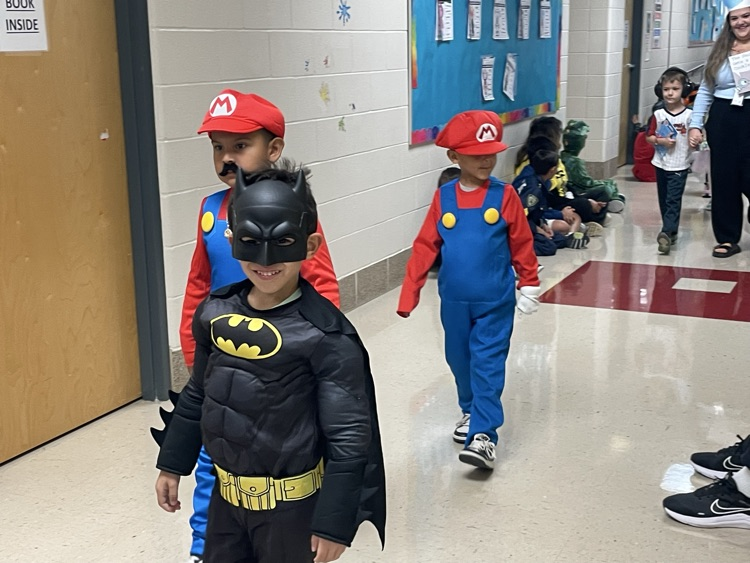 Sippel character parade with students and teachers dressed up 