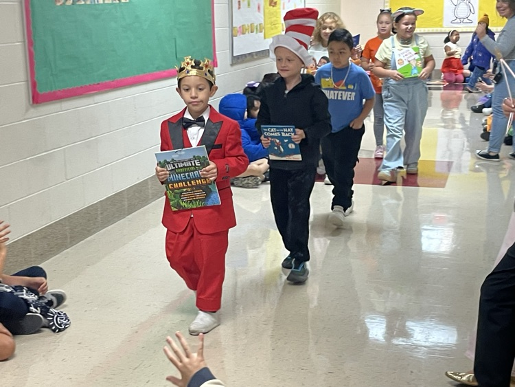 Sippel character parade with students and teachers dressed up 