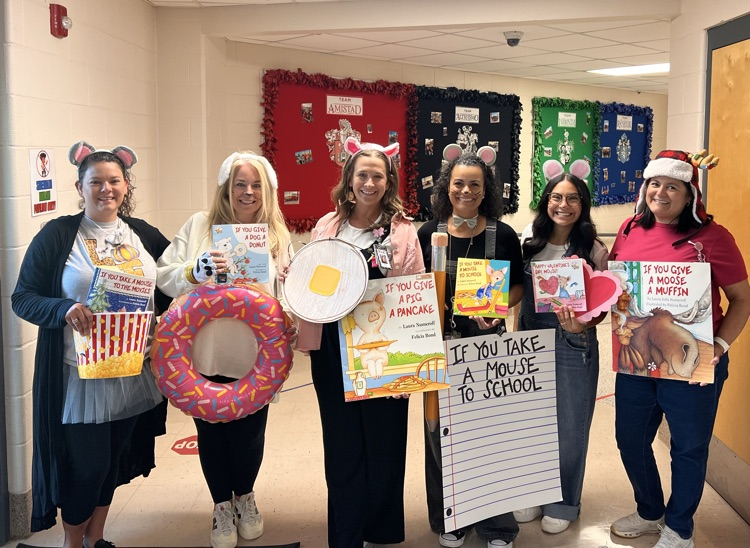 Sippel character parade with students and teachers dressed up 