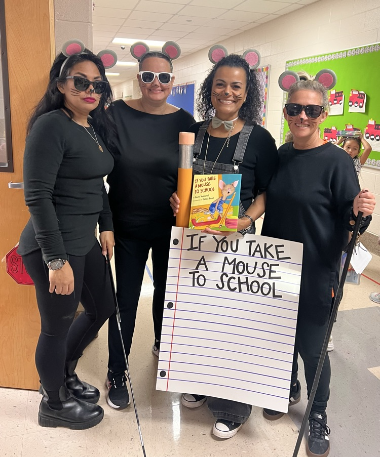 Sippel character parade with students and teachers dressed up 