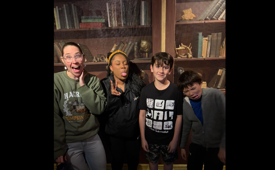 Ms. Reagan and Ms. Parks with two Wilder students