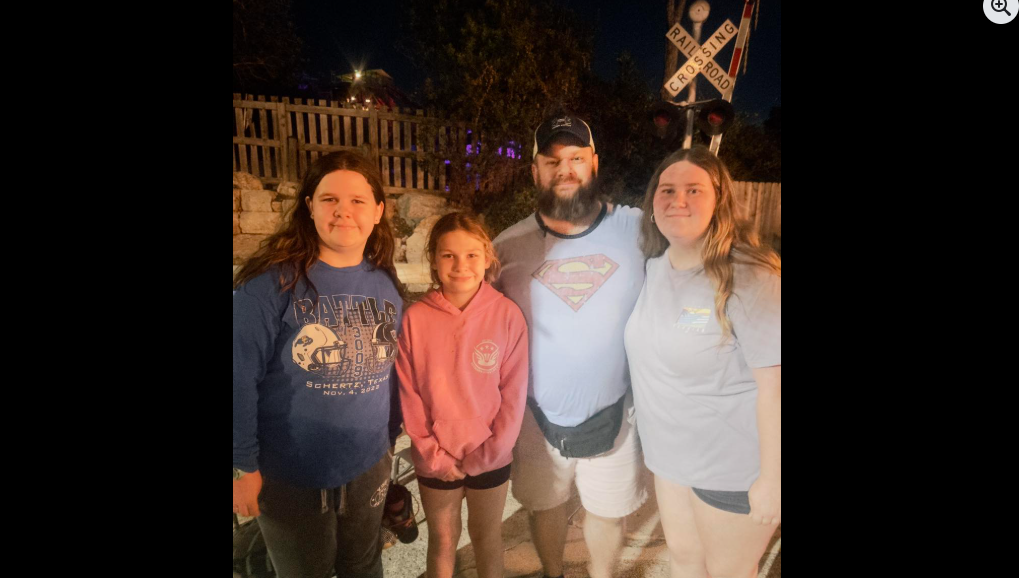 Wilder family posing at Six Flags