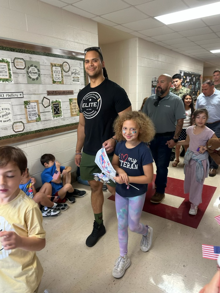veteran parents and students walking the halls