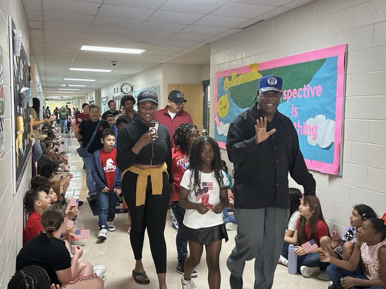 veteran parents and students walking the halls