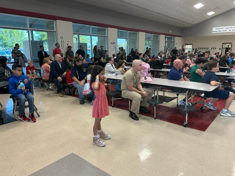 veteran parents and students walking the halls