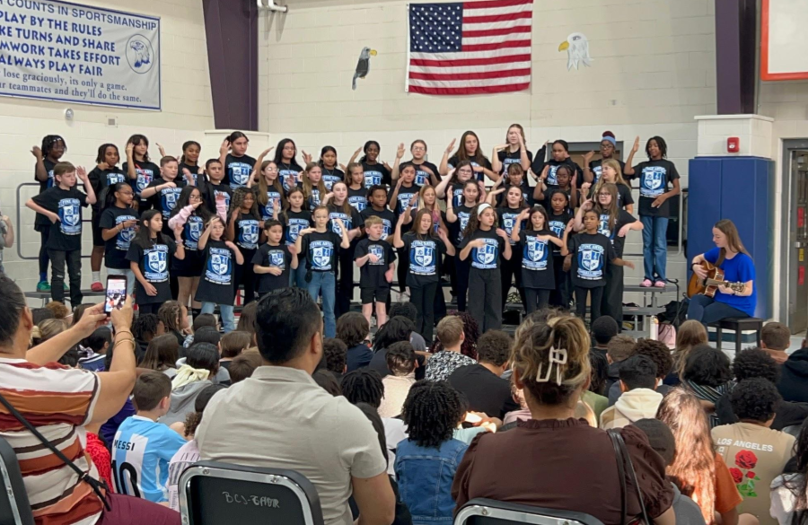 picture of the Jordan choir performing at the veterans day assembly