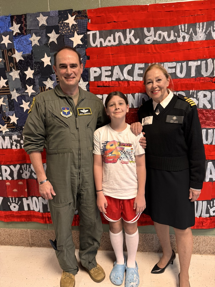 Veteran parents with their daughter