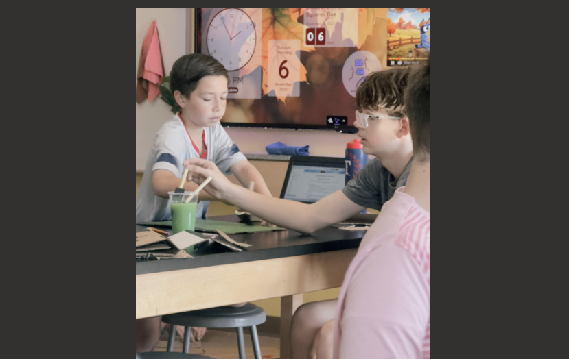 students painting their project