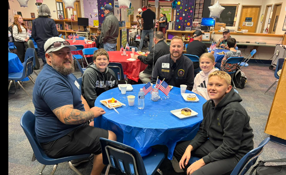 veterans with their family in the library