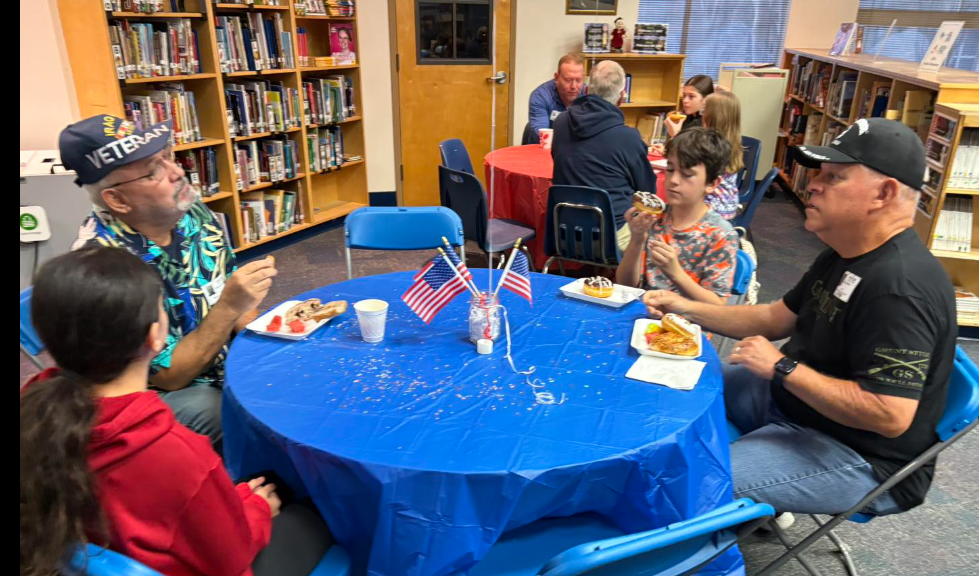 veterans and wilder students enjoying breakfast