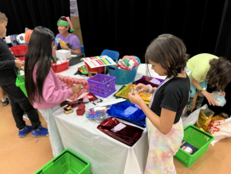 students picking out gifts