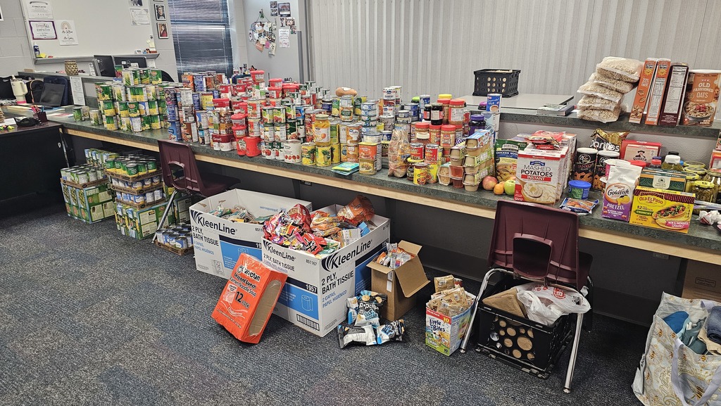 a full table worth of food drive foods