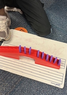 Kids playing with dominoes in their club