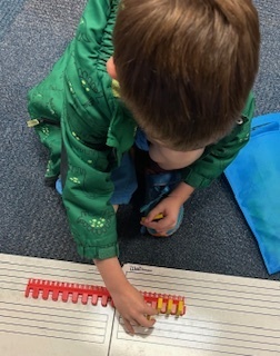 Kids playing with dominoes in their club