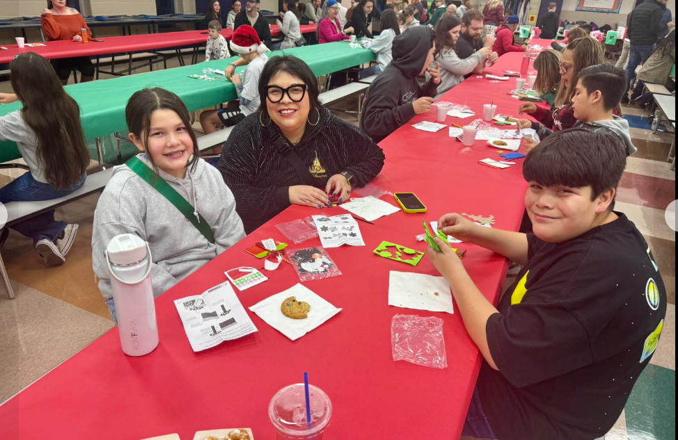 family making crafts in the cafe