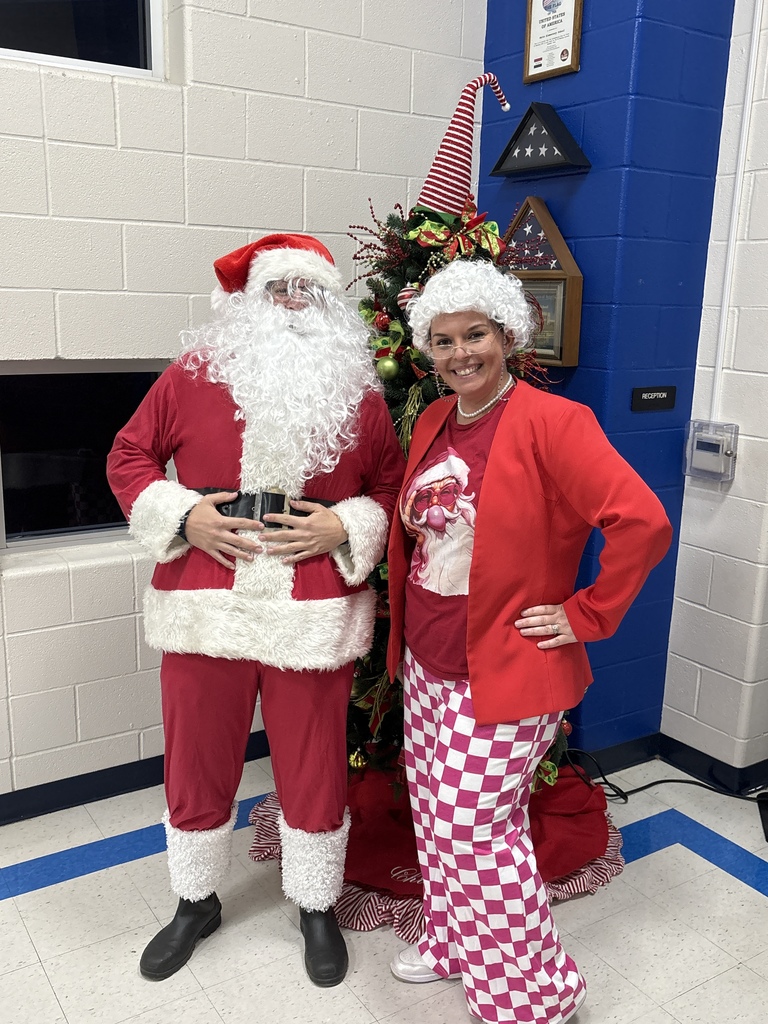 Santa Claus and Mrs. Claus were surprise guests during the 2nd grade Holiday Program
