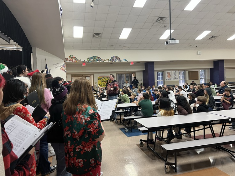choir students singing to Wilder students