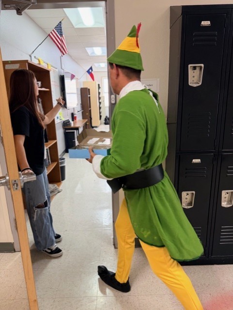 Buddy gives treats to the winning CT