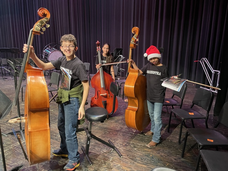 Kids posing with Big bassoons 