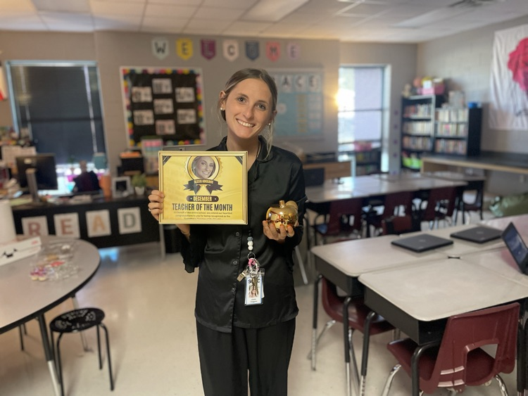 miss Scoggins with her award