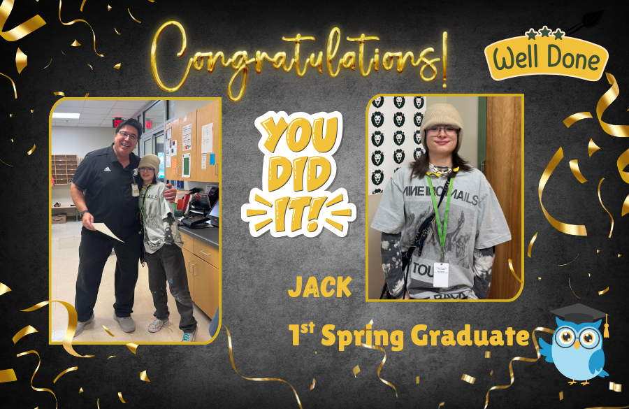 student posing for picture with principal