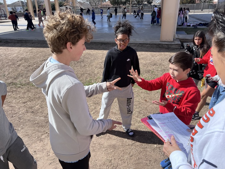 rock beats paper as students challenge each other