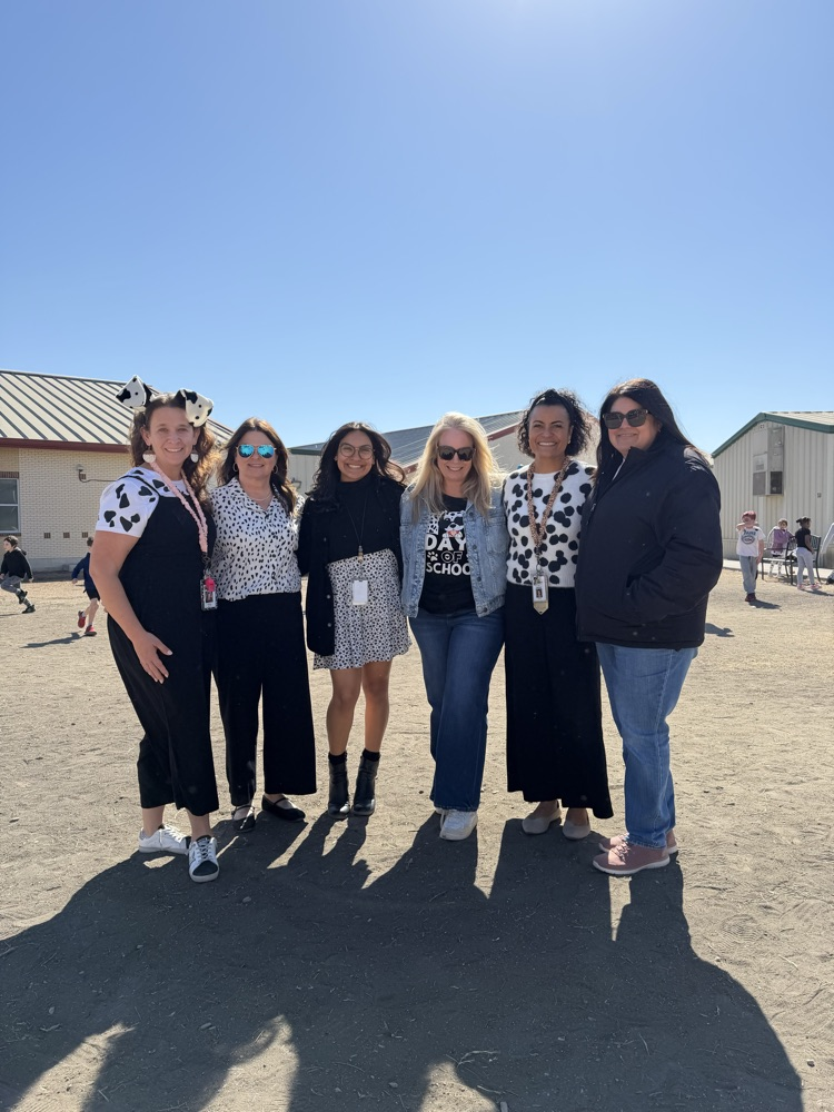 teachers in group photo for 101st day of school