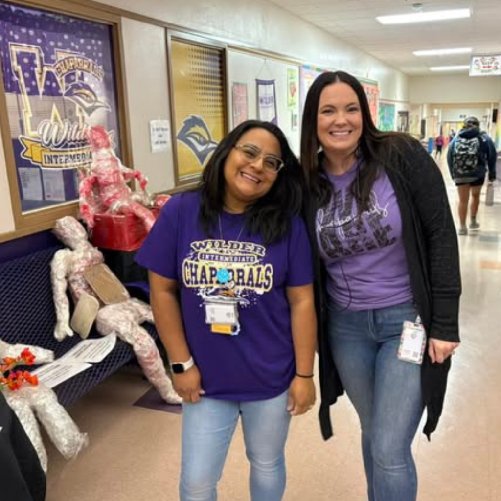 Mrs. Trevino and Mrs. Dean in hallway