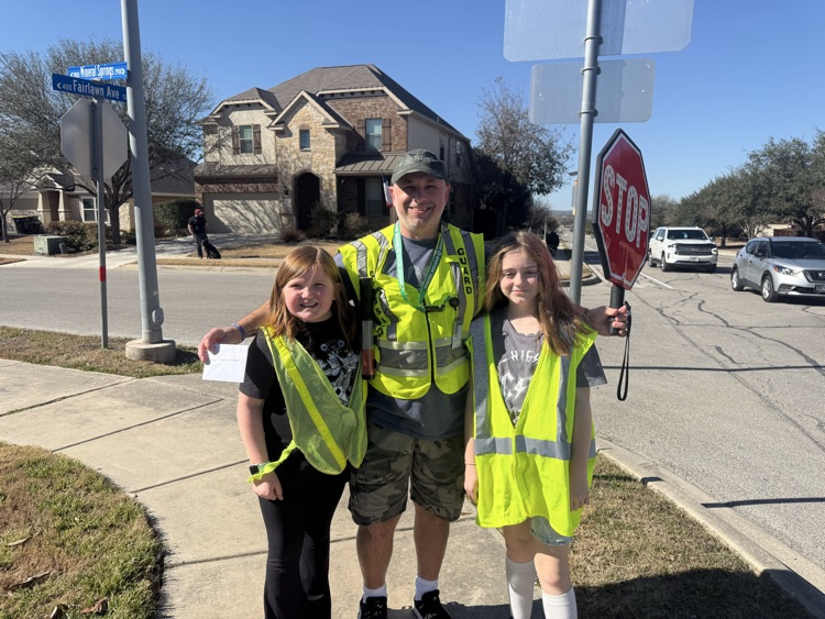 students with crossing guard