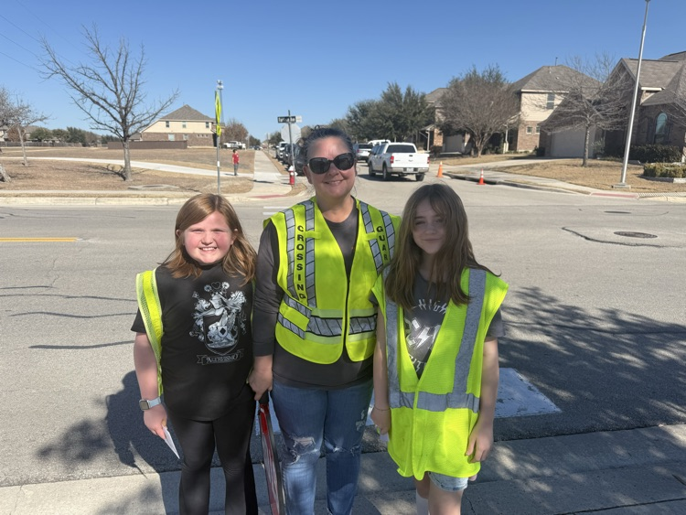 students with crossing guard