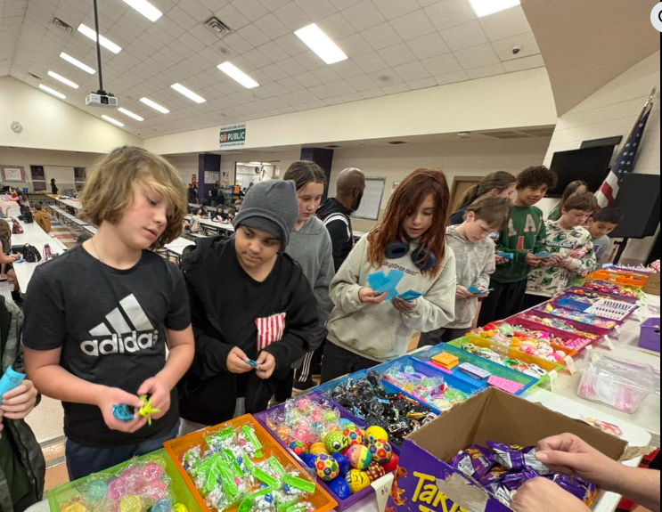 students spending their wilder bucks at the school store
