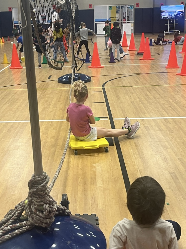 kid pulling rope on scooter