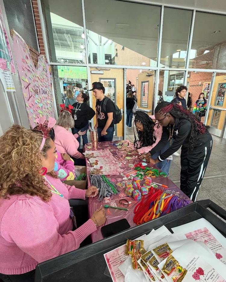 counselors giving out hearts for messages