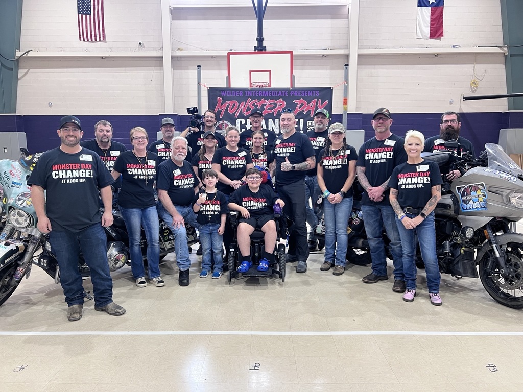 Gaven taking a picture with all the Mile Monsters