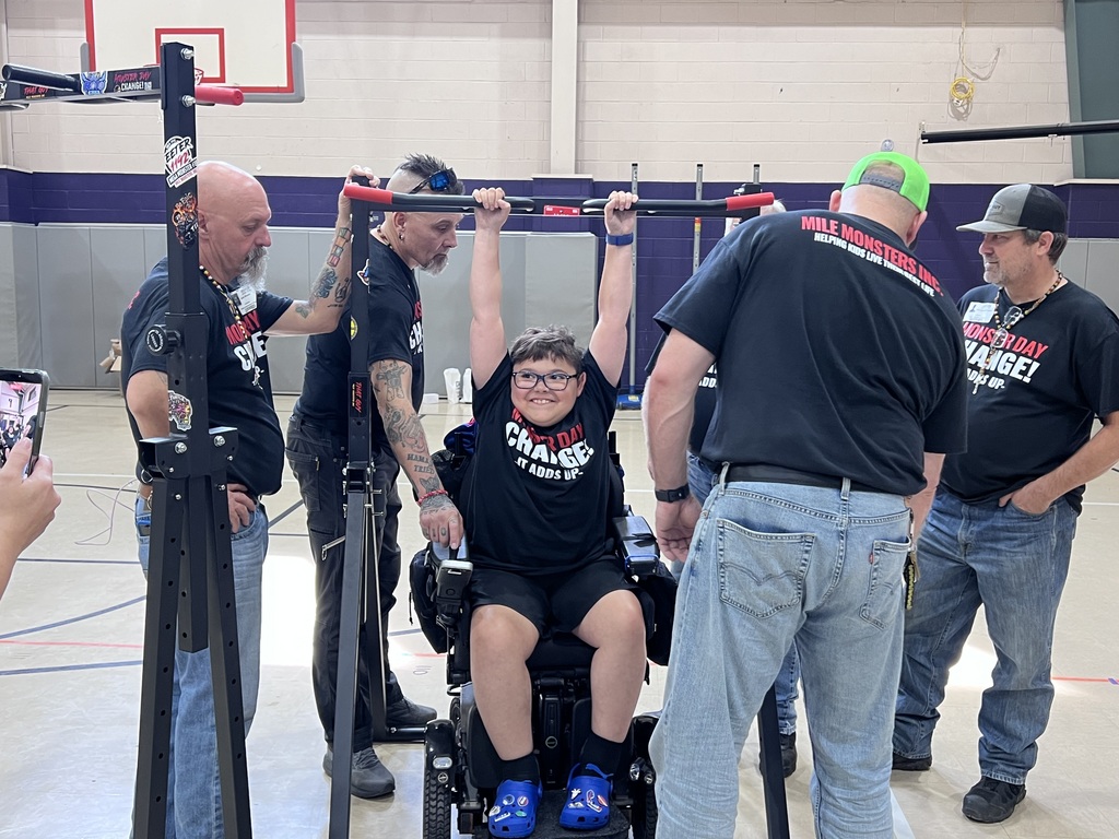Gaven testing his strength on a pull up bar.