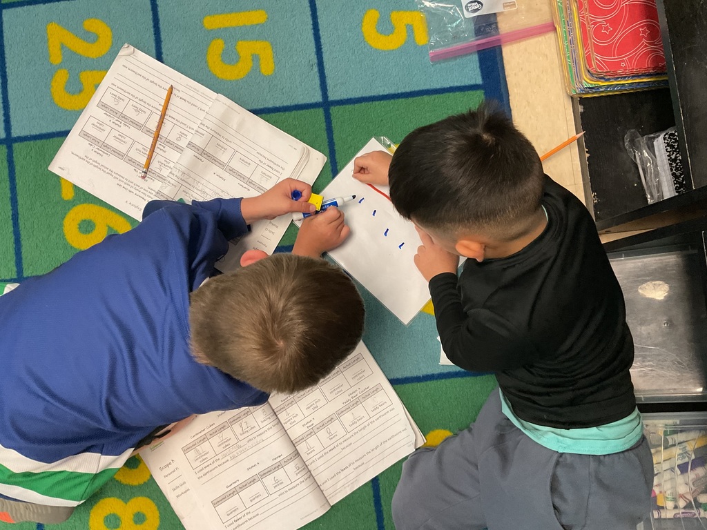 Students measuring using iteration. 