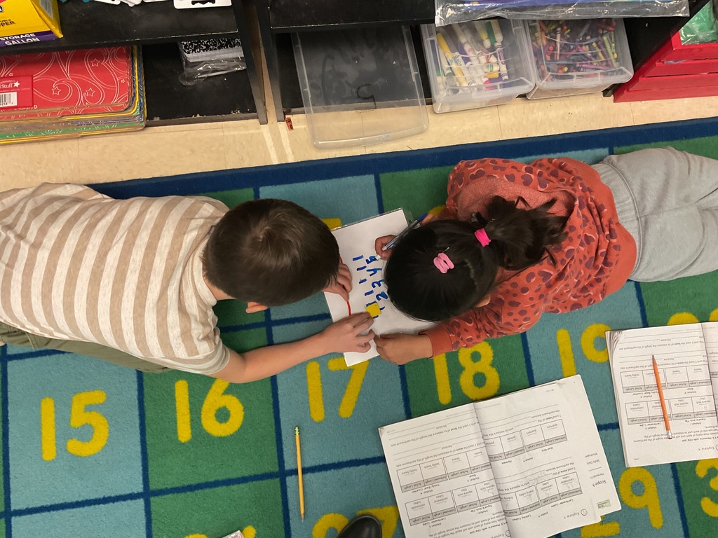 Students measuring using iteration. 