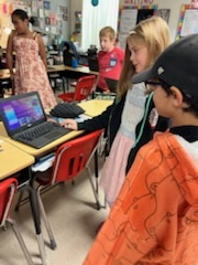 4th grade students presenting their work for black history month