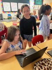 4th grade students presenting their work for black history month