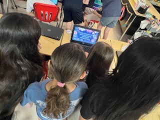 4th grade students presenting their work for black history month