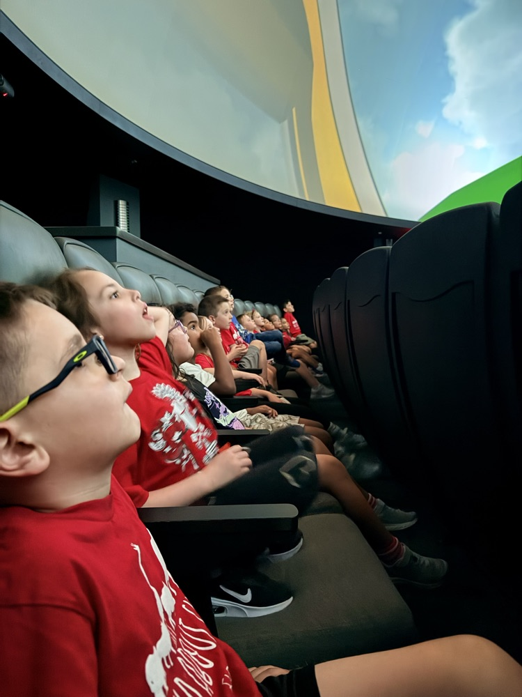 students at the planetarium