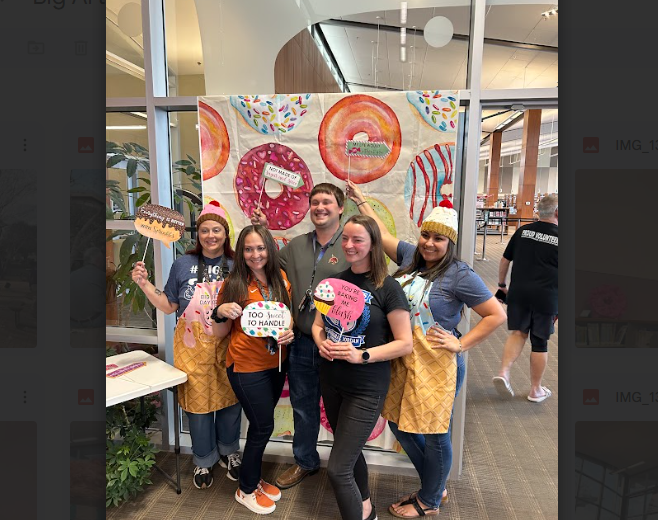 teachers posing for picture with sweets