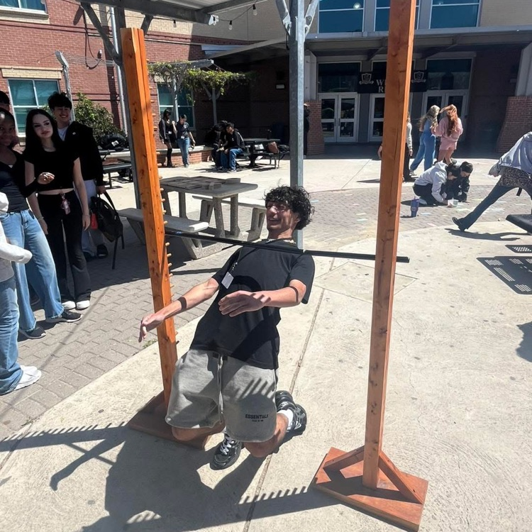 student playing limbo