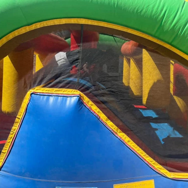 students in a bounce house