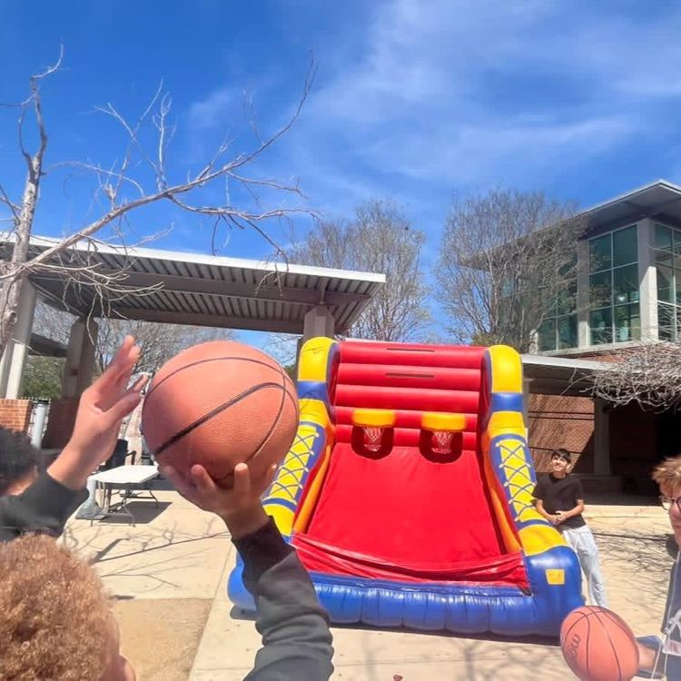 students playing basketball