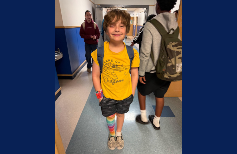student posing with crazy socks