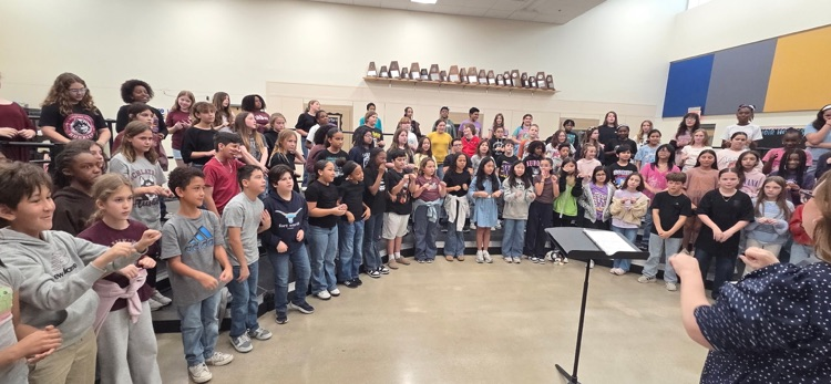 choir listening and practicing