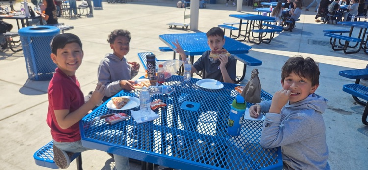 found boys eating lunch outside