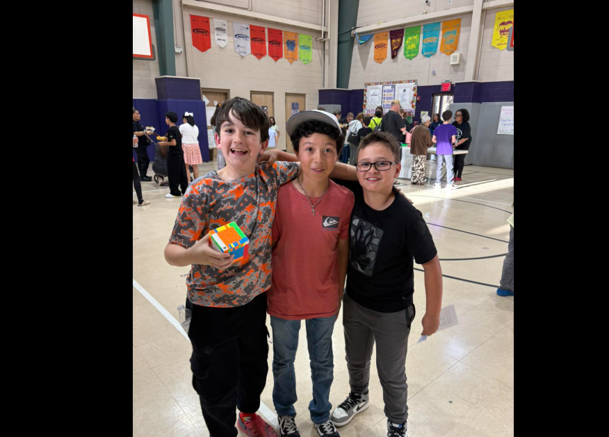 6th grade boys posing in gym